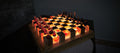 Luminous Inferno - Illuminated Teak & Resin Chess Set with Lava-Inspired Elements